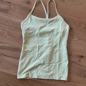 Light yellow Lululemon racerback tank. Size 6.